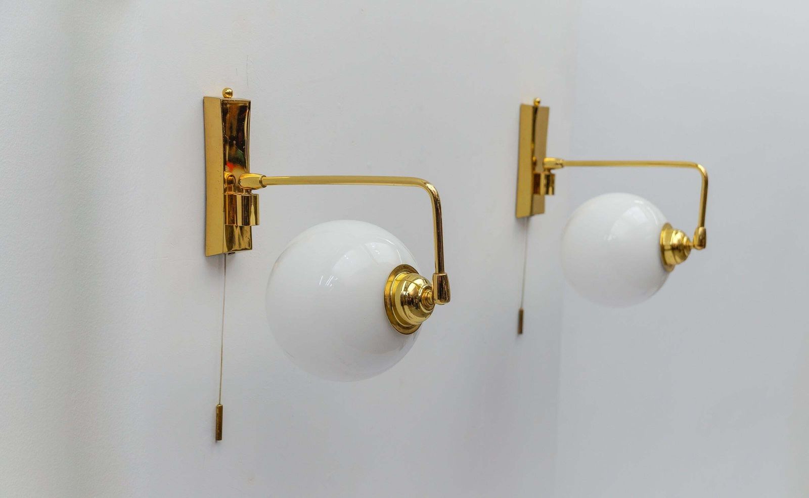 photo furniture Pair Of Lovely Mid Century Modern Wall Lamps In Brass And Milk Glass, 1960s