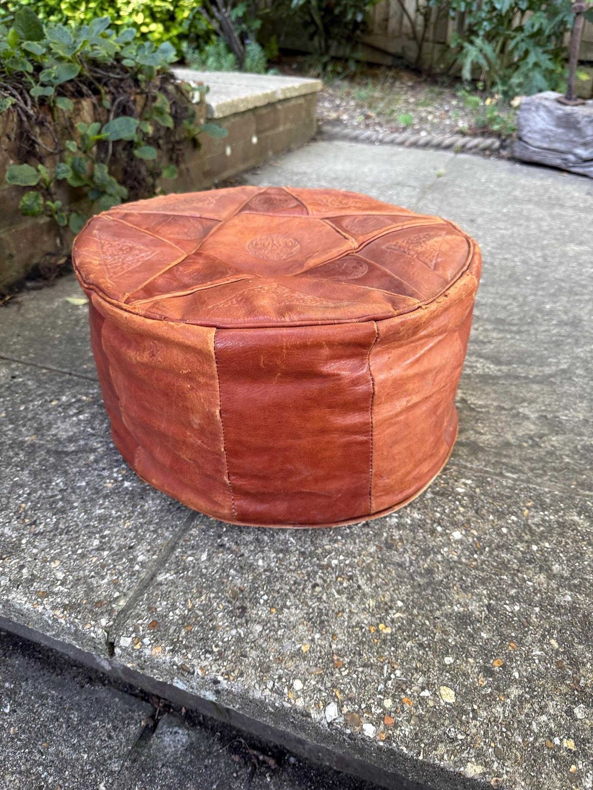 Vintage Leatherette Moroccan Style Pouf – Embossed Tan Footstool With Threaded Base, Rustic And Comfy photo for sale