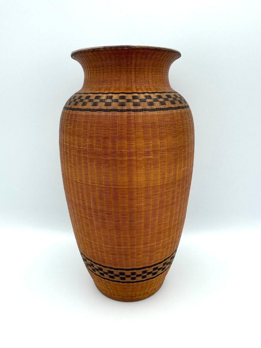 Porcelain Chinese Vase Wrapped In Rattan photo furniture
