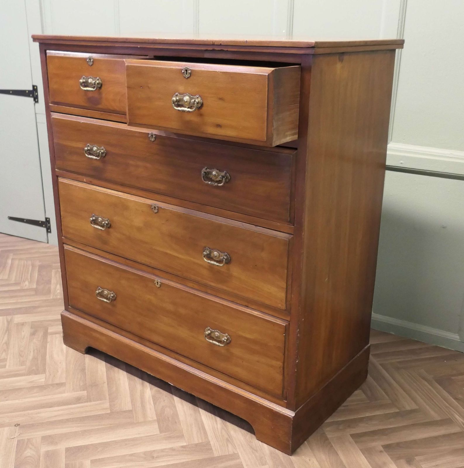 A Large Edwardian Walnut Chest Of Drawers photo for sale