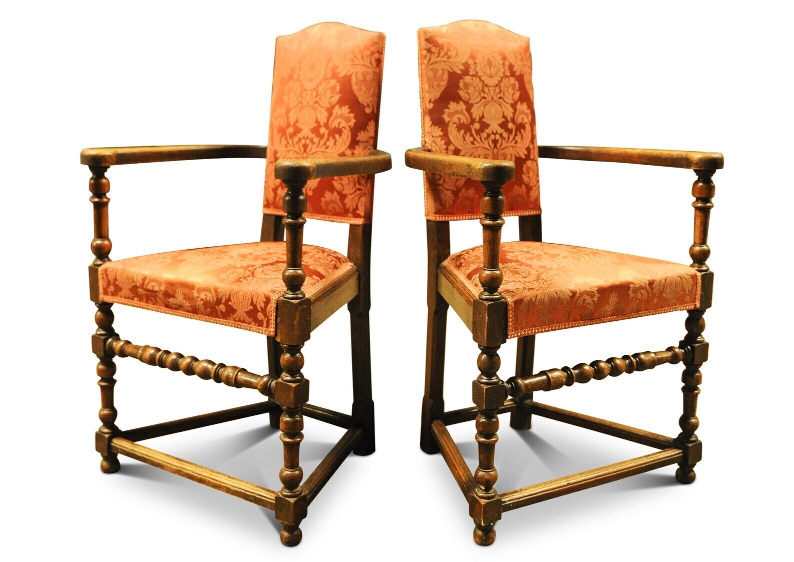 A Pair Of Oak Turned Elbow Chairs In An Early English Style With Rails And Stretchers With A Burnt Orange Damask Upholstery photo for sale