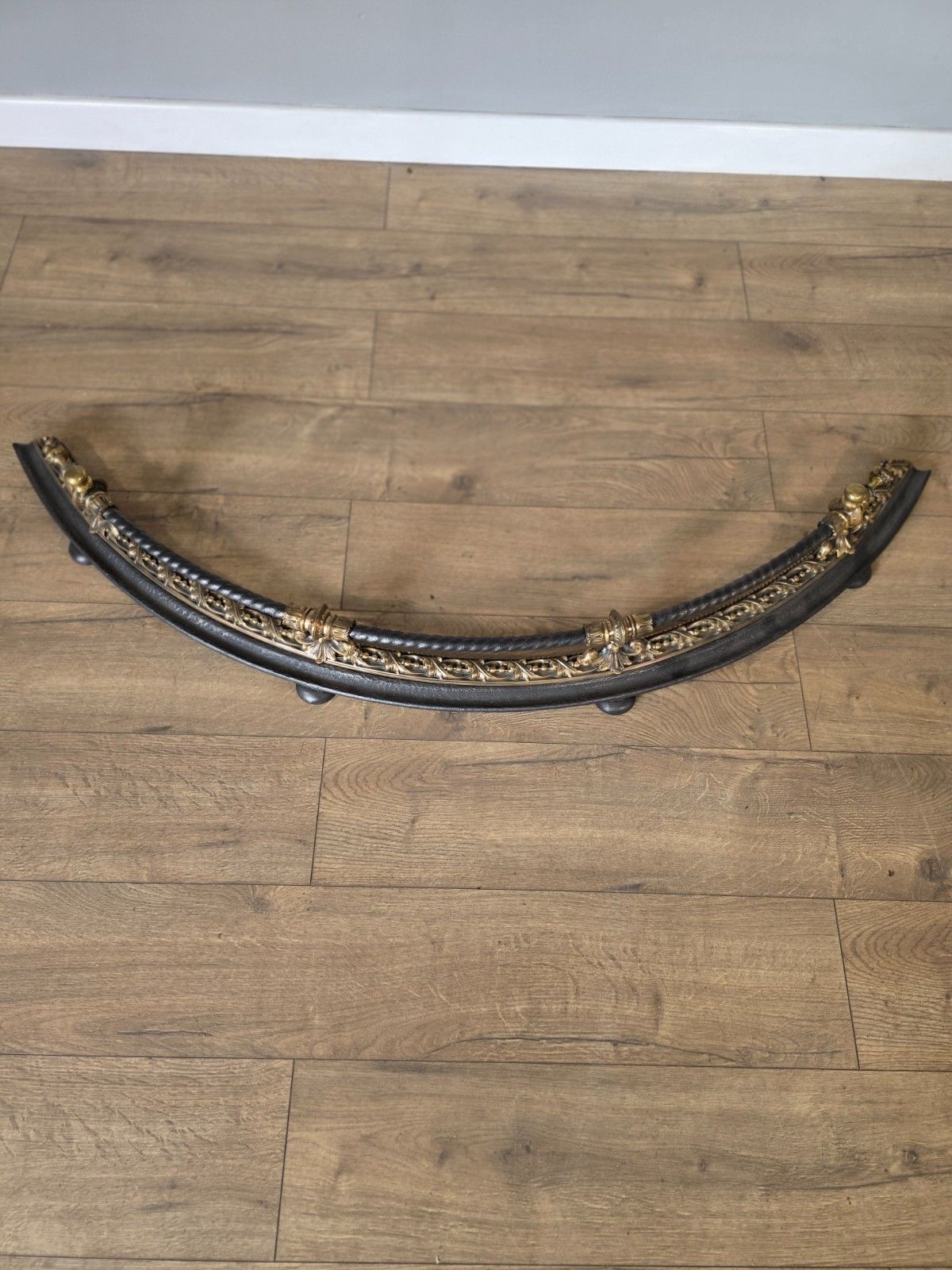 photo for sale Antique 19th Century Curved Bronze And Iron Fire Fender