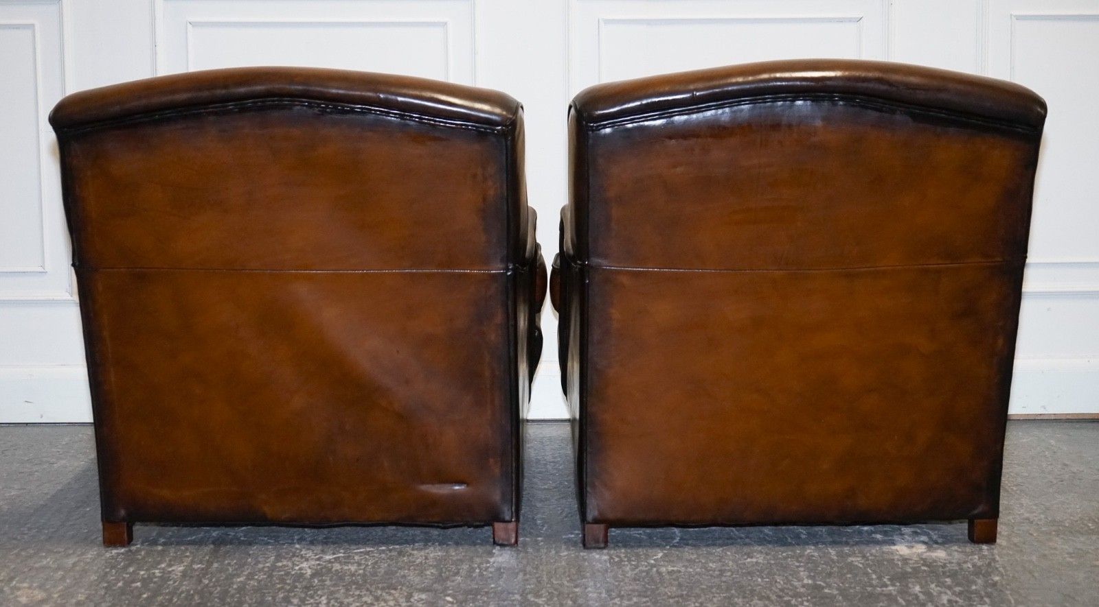 photo buy Pair Of Cigar Hand Dyed Leather Howard & Sons Style Armchairs On Castor Feet