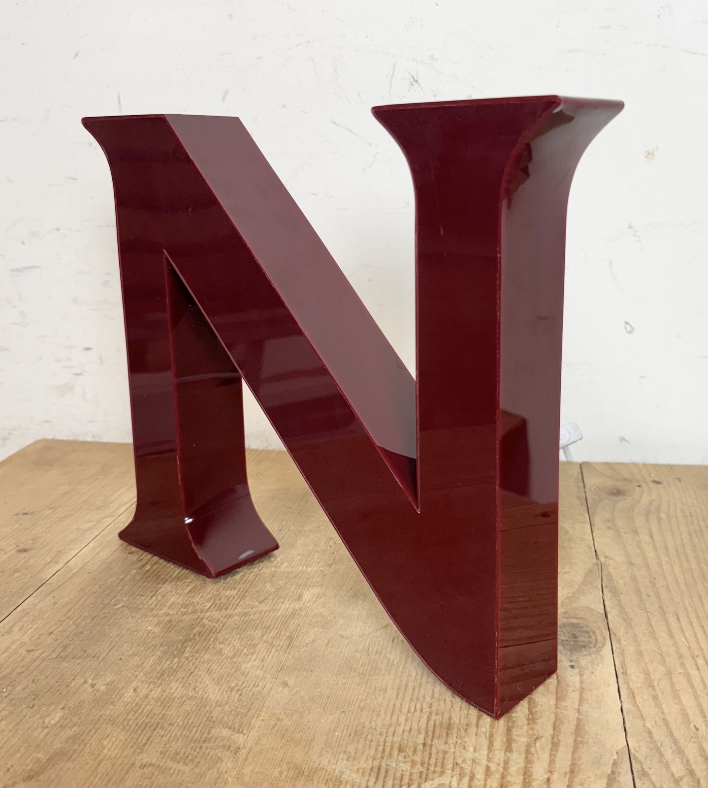 Vintage Dark Red Illuminated Letter N , 1980s photo vintage
