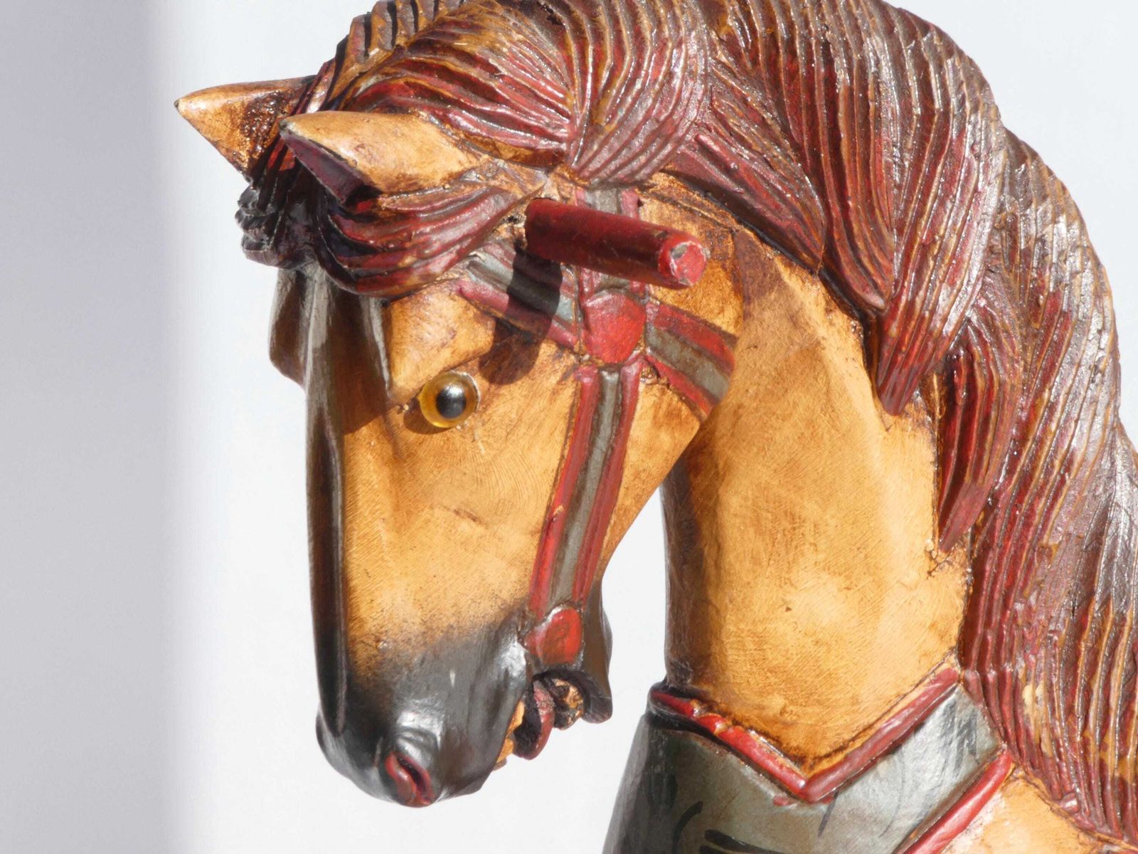 photo furniture Wood Carved Rocking Horse With Glass Eyes, Carousel Horse With Floral Painted Details, Old Animal Toy On Wheels, Art Object