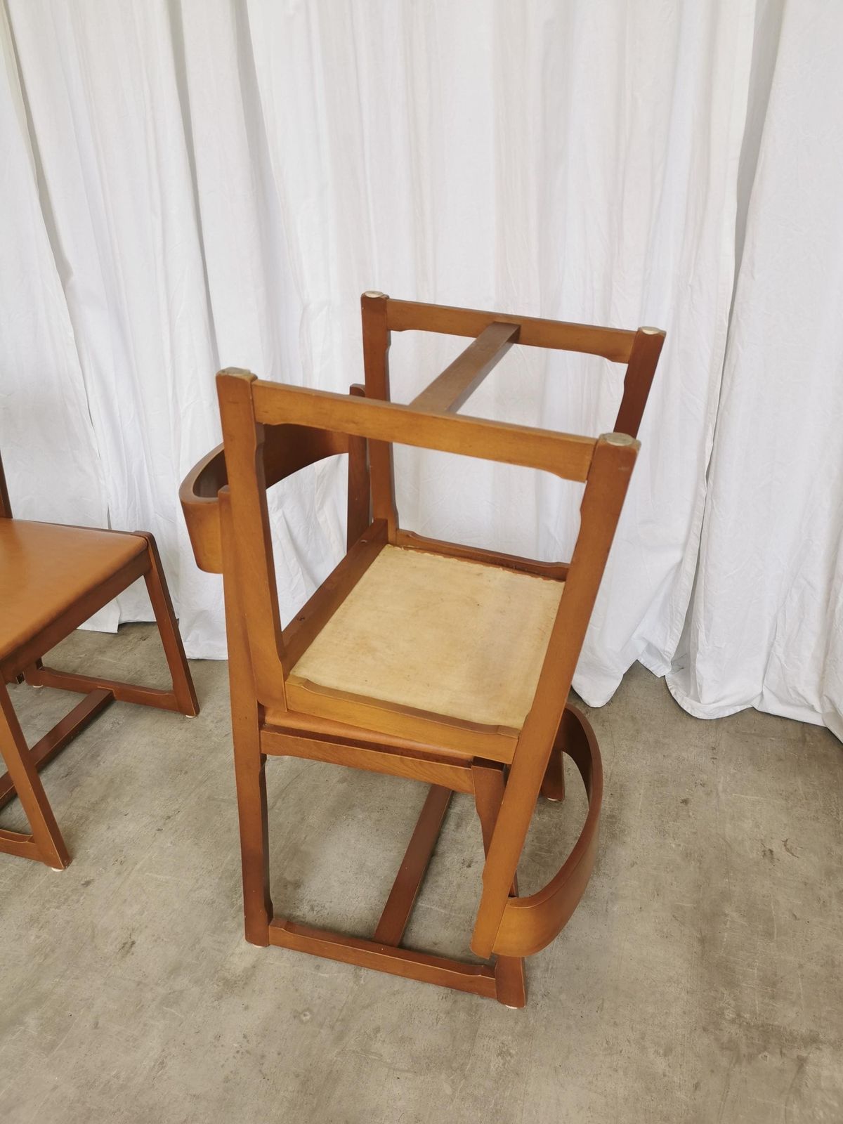 photo furniture Set Of 4 Vintage Dining Chairs / 1970s Mid Century Wooden Sculptural Design With Brown Caramel Faux Leather Seats / Italian Modernist Design