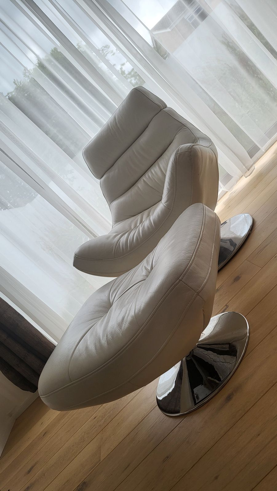 Furniture Village White Leather Salvador Swivel Chair And Footstool photo furniture