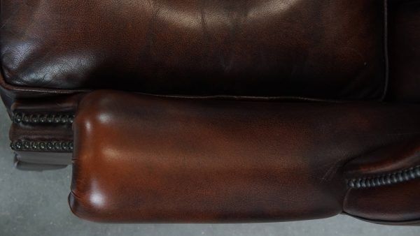 Luxueuze Chesterfield Wingback Fauteuil In Warm Bruin Koeienhuid Met Unieke Details photo vintage