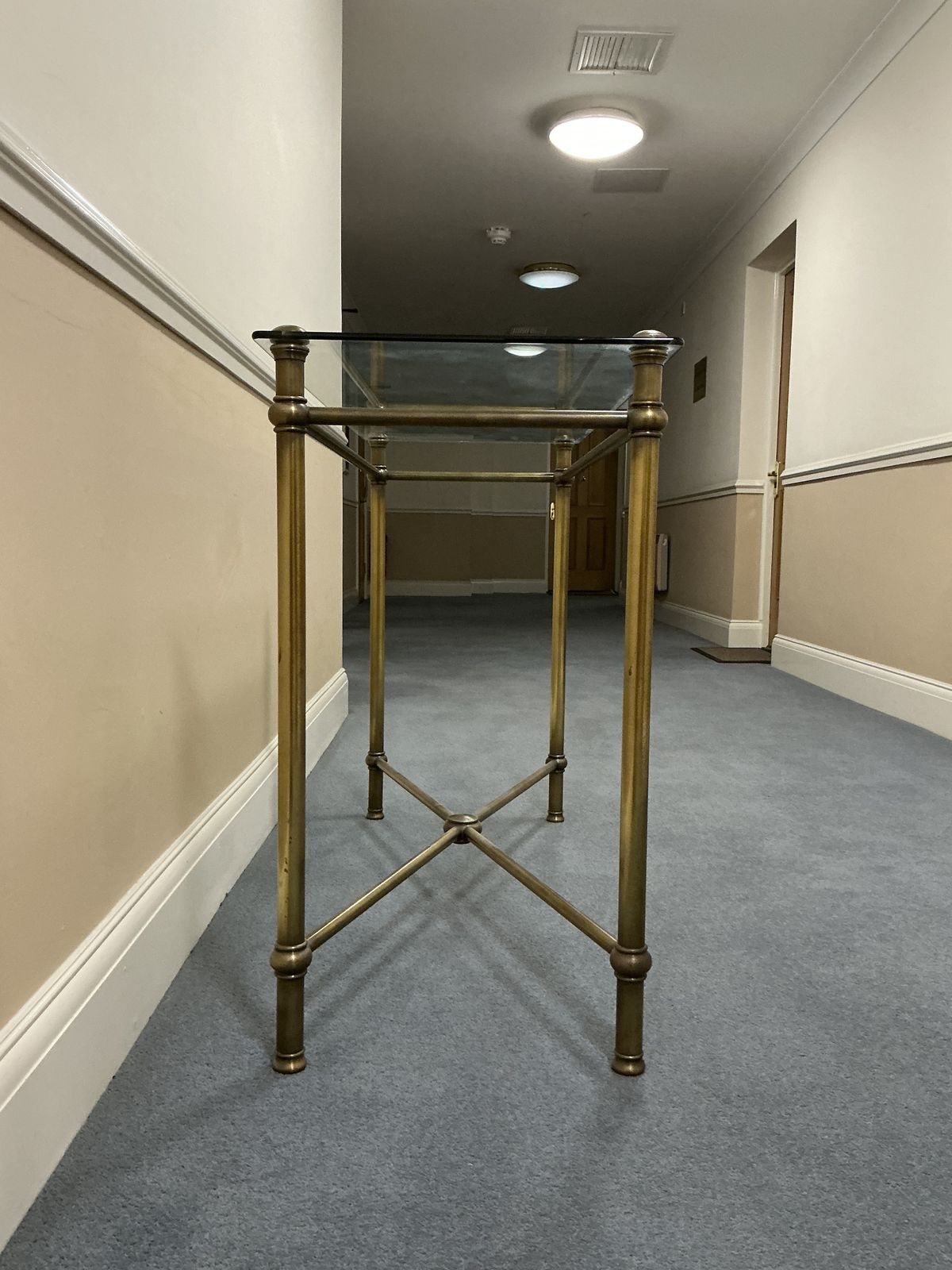 Stylish Metal Glass Top Console photo vinterior