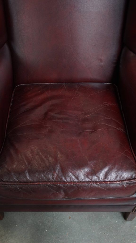 Set Of 2 Beautiful And Comfortable Burgundy Red Cowhide Wing Chairs In English Style With A Beautiful Patina photo buy