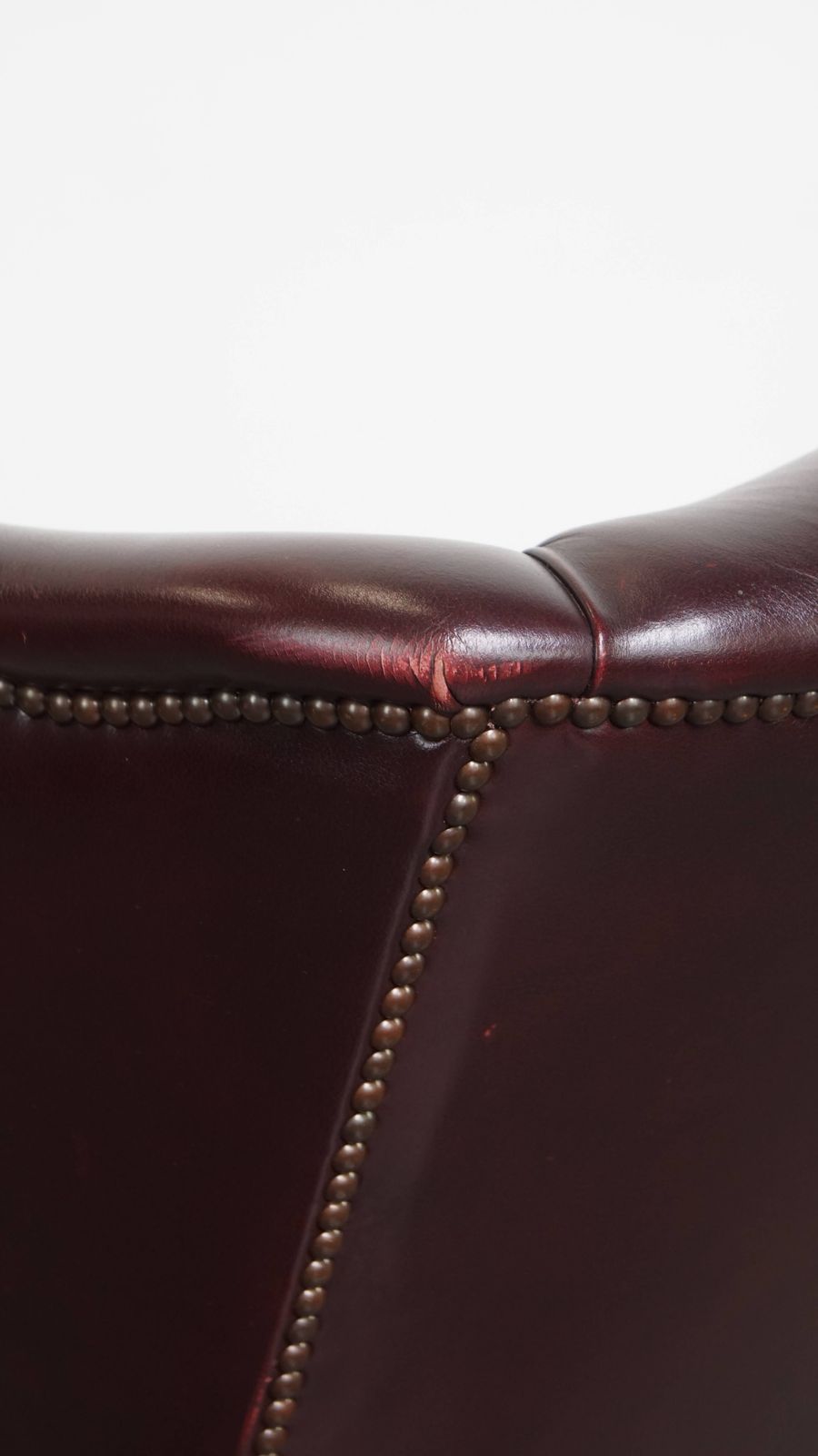 photo buy Beautiful And Comfortable Burgundy Red Cowhide Wing Chair In English Style With A Wonderful Patina
