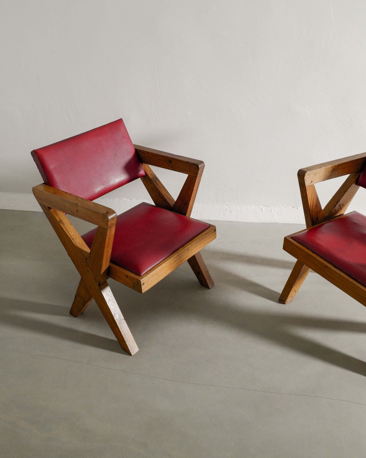 Pair Of French Mid Century Wooden "X Chairs" In Teak And Original Red Leather By Pierre Jeanneret, 1950s photo furniture