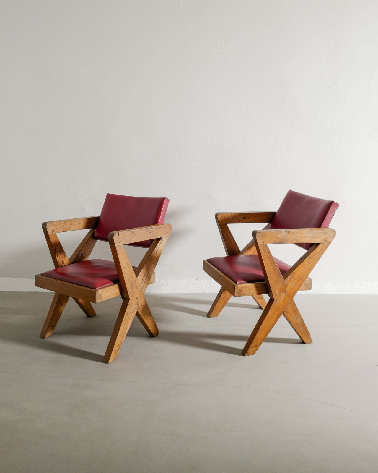 Pair Of French Mid Century Wooden "X Chairs" In Teak And Original Red Leather By Pierre Jeanneret, 1950s photo vinterior