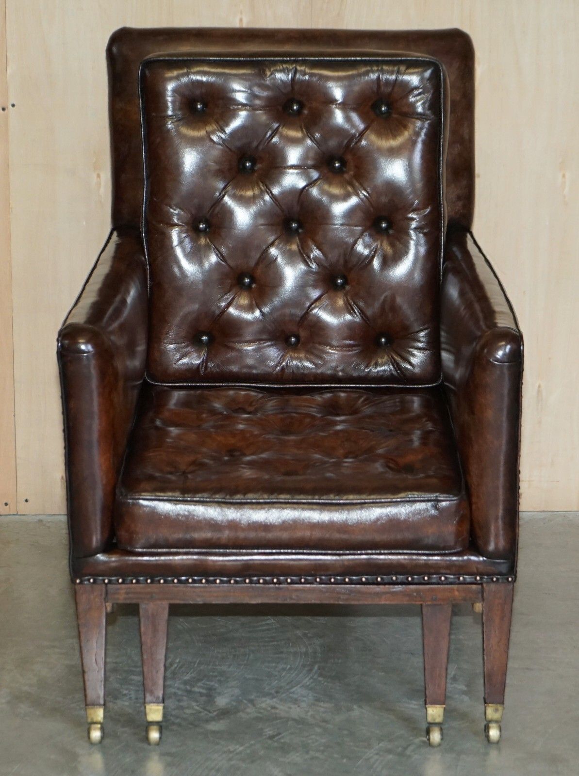 Pair Of Antique Regency  Brown Leather Chesterfield Armchairs Extending Stools photo for sale