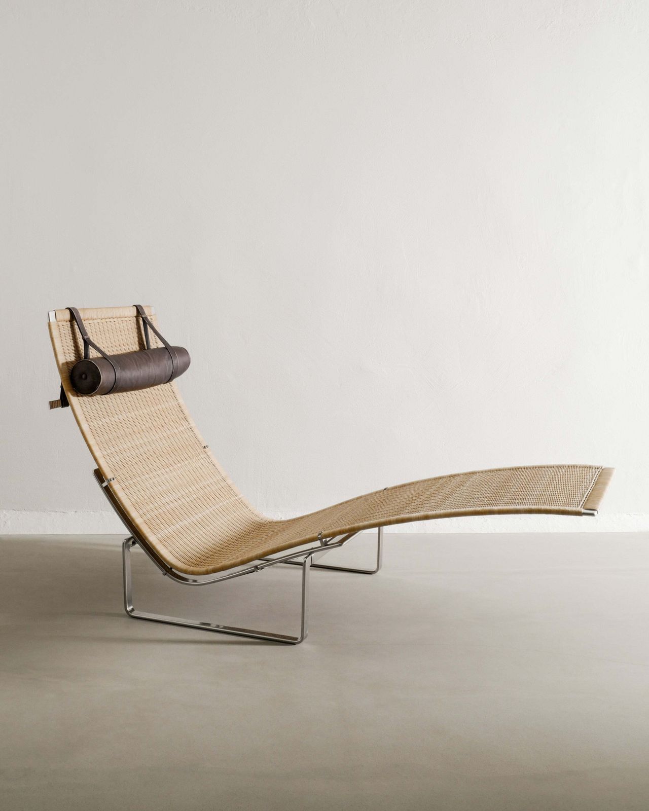 Danish Mid Century Sculptural Chaise Lounge "Pk24" Chair In Rattan, Steel & Leather By Poul Kjærholm For E. Kold Christensen Denmark, 1960s photo for sale