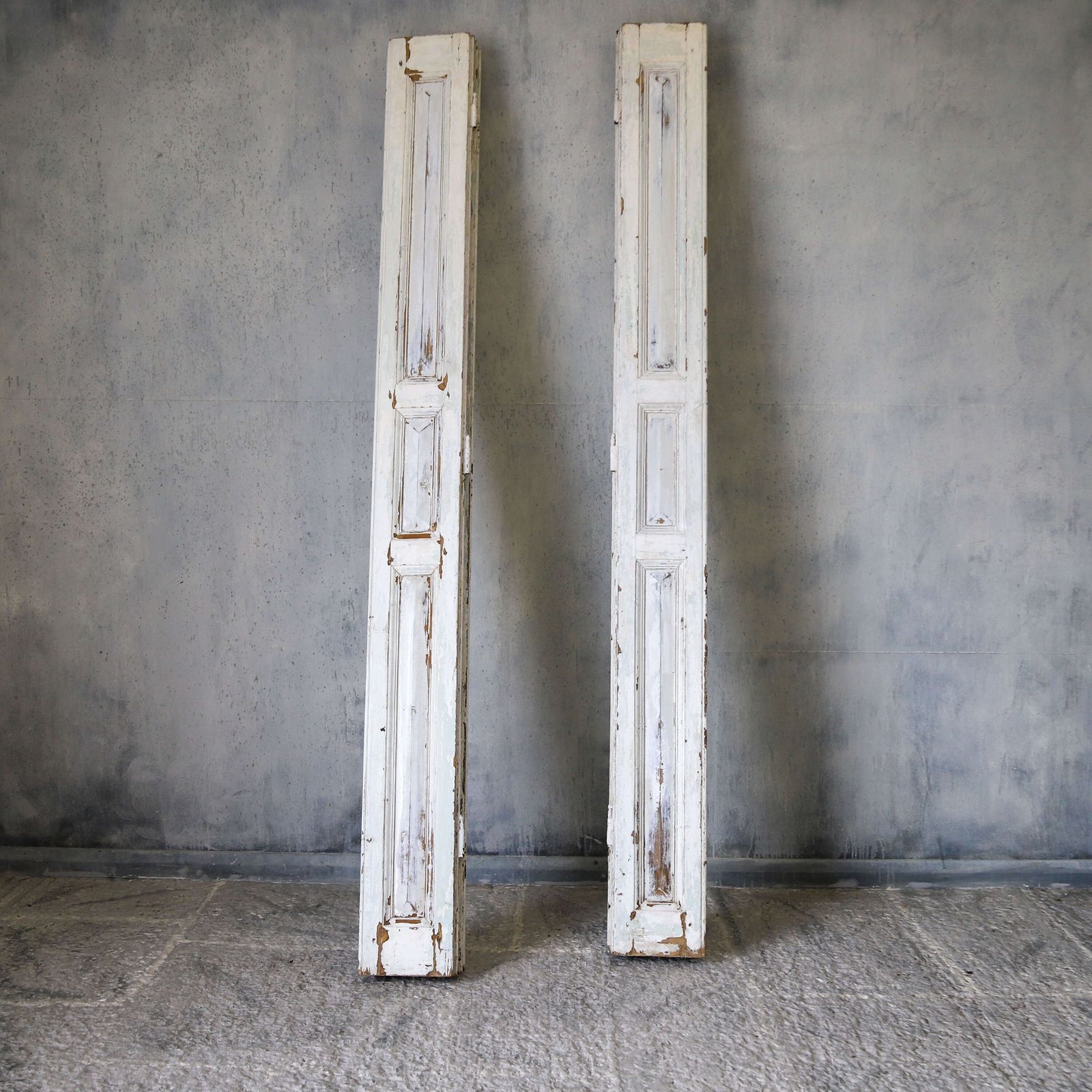 Pair Of Antique Panelled Tri Folding Shutters In Original Cream Paint photo furniture