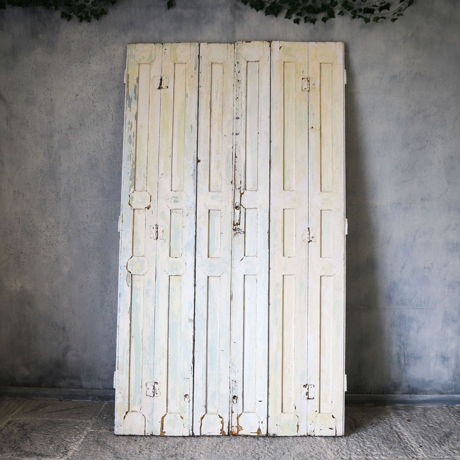 Pair Of Antique Panelled Tri Folding Shutters In Original Cream Paint photo 505.0