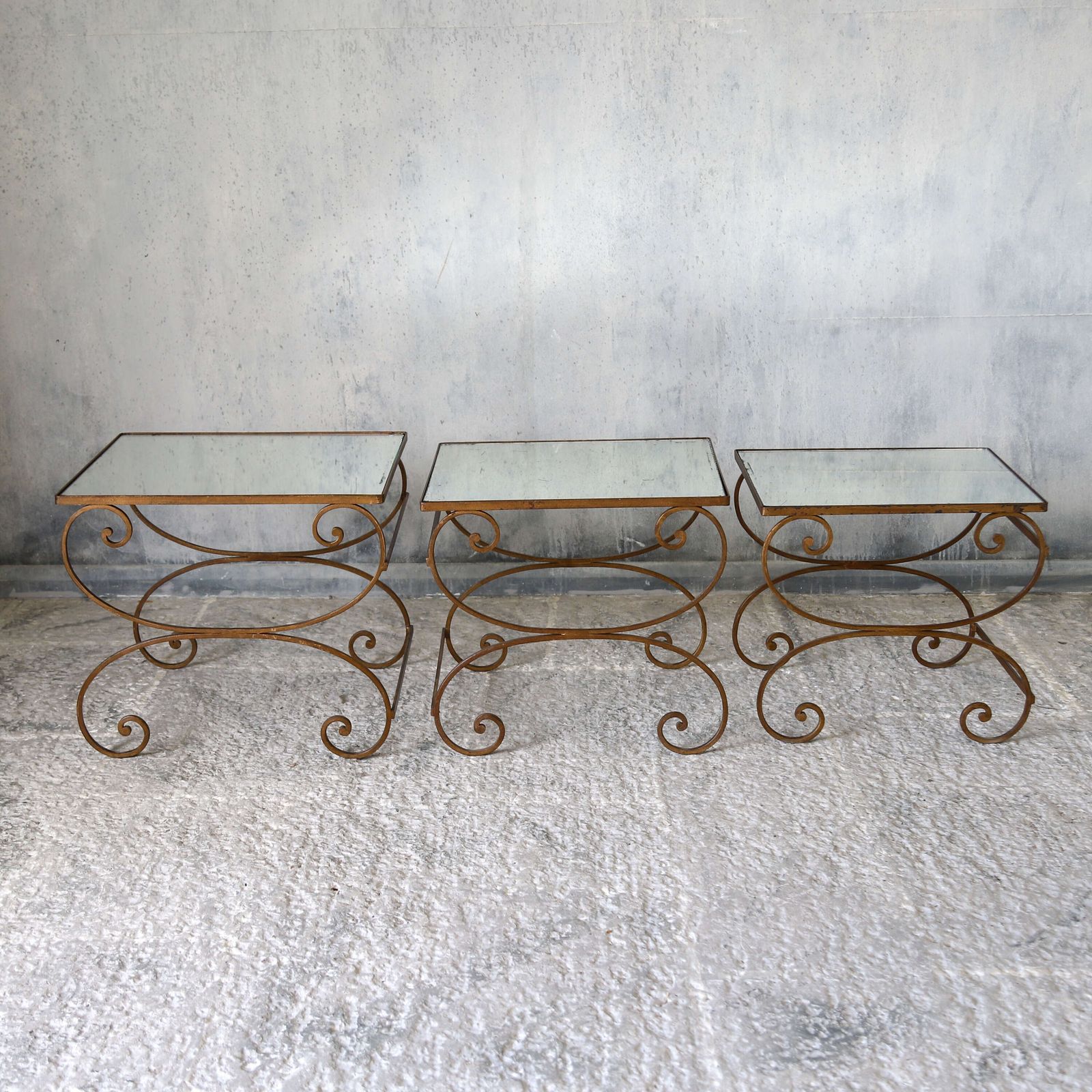 Mid Century Italian Nest Of 3 Gilt Metal Tables With Distressed Mirrored Tops photo furniture