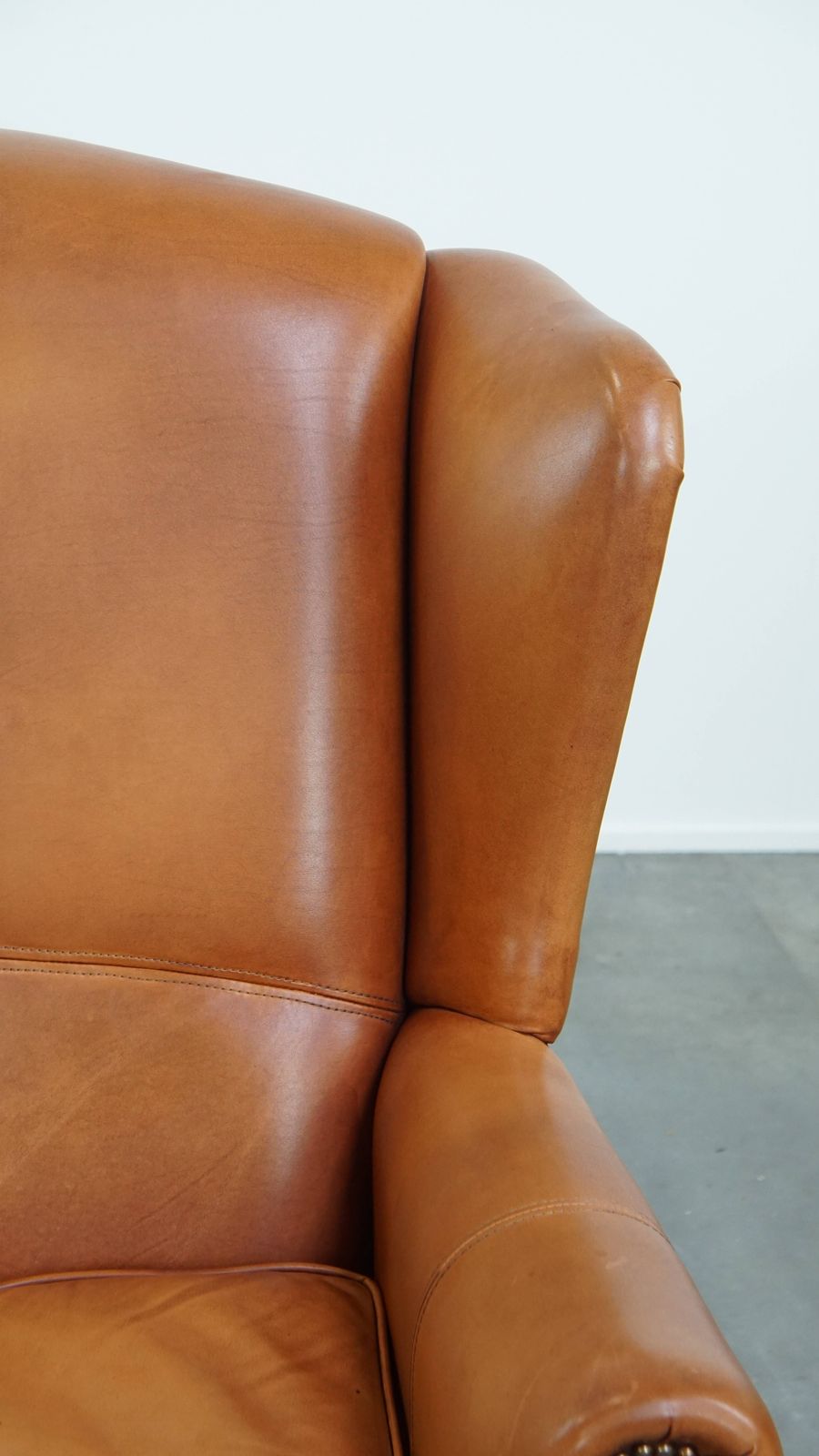photo for sale Classic And Unique Cowhide Wing Chair Finished With Decorative Nails And Beautiful Details