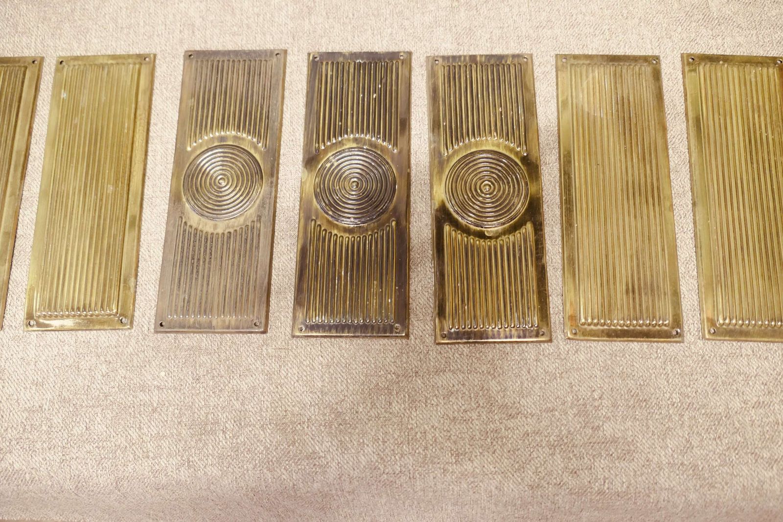 A Large Set Of 12 Art Deco Brass Door Finger Plates photo for sale