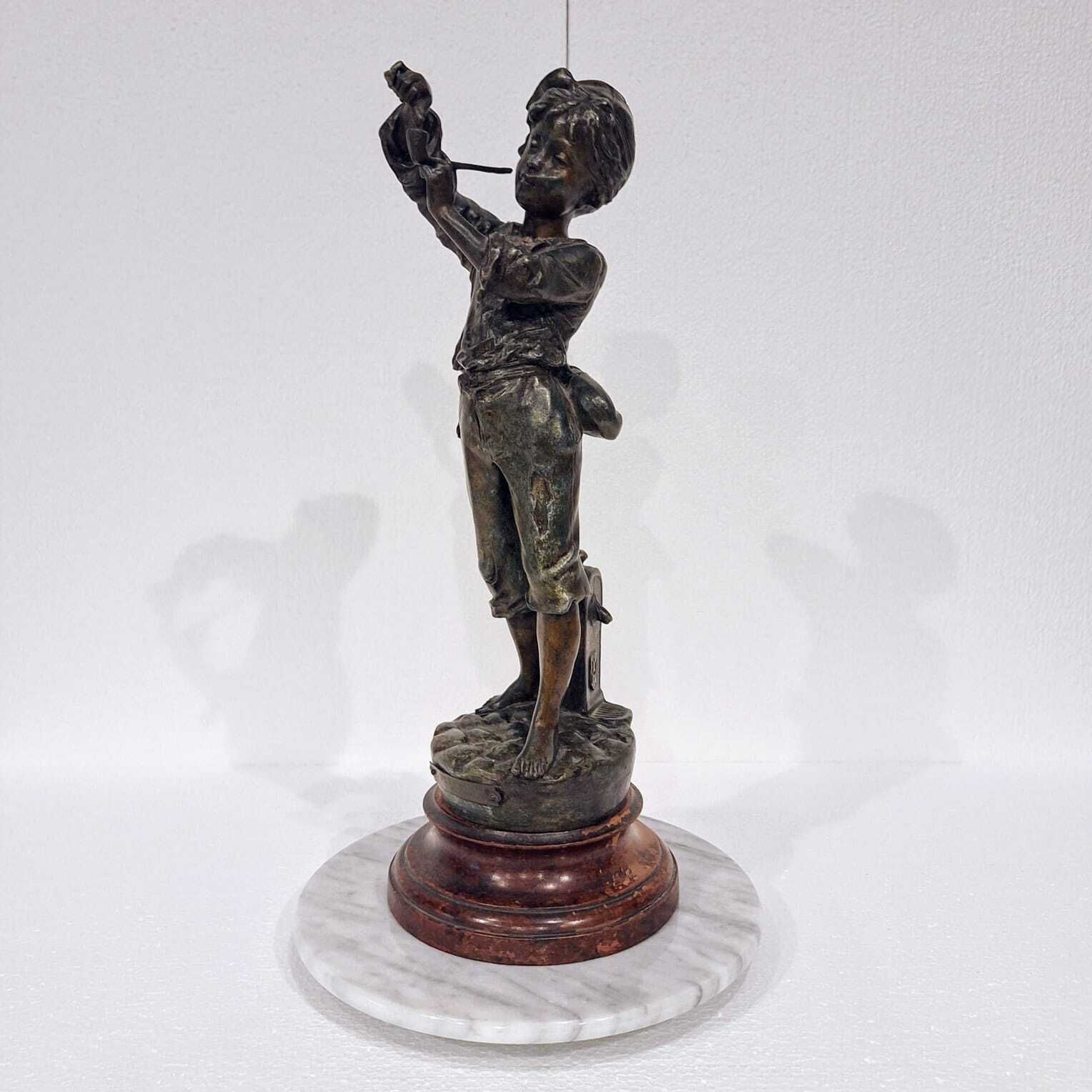 A French Spelter Statue Of A Boy Lighting A Pipe photo Art