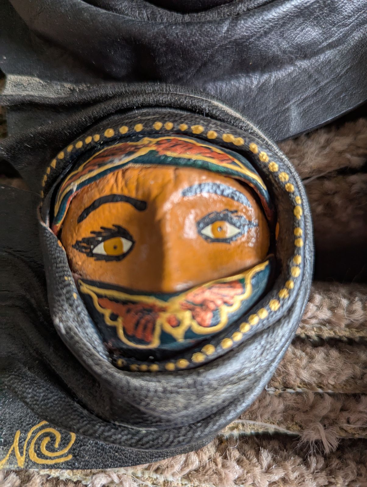 photo for sale The Silent Council – Seven Sculptural Leather Faces By Tch Piel, Dominican Republic