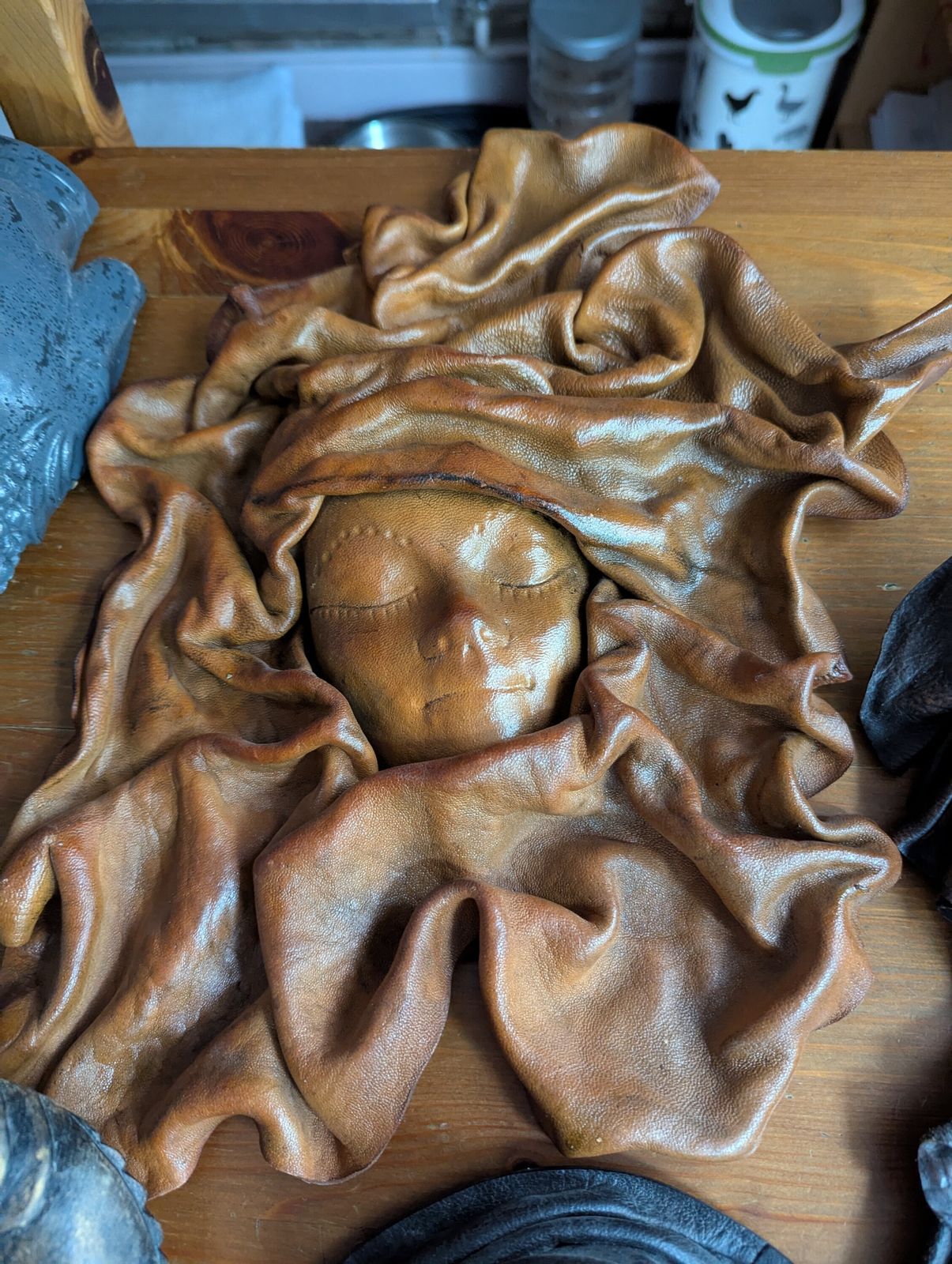 294.98 The Silent Council – Seven Sculptural Leather Faces By Tch Piel, Dominican Republic photo