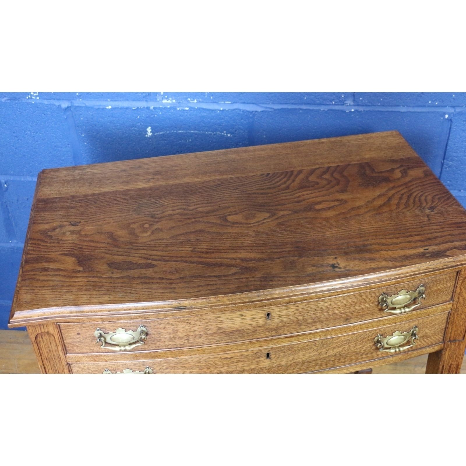 A Quality Oak Bow Fronted Two Drawer Side Table Raised On Tapering Spade Feet photo 390.0
