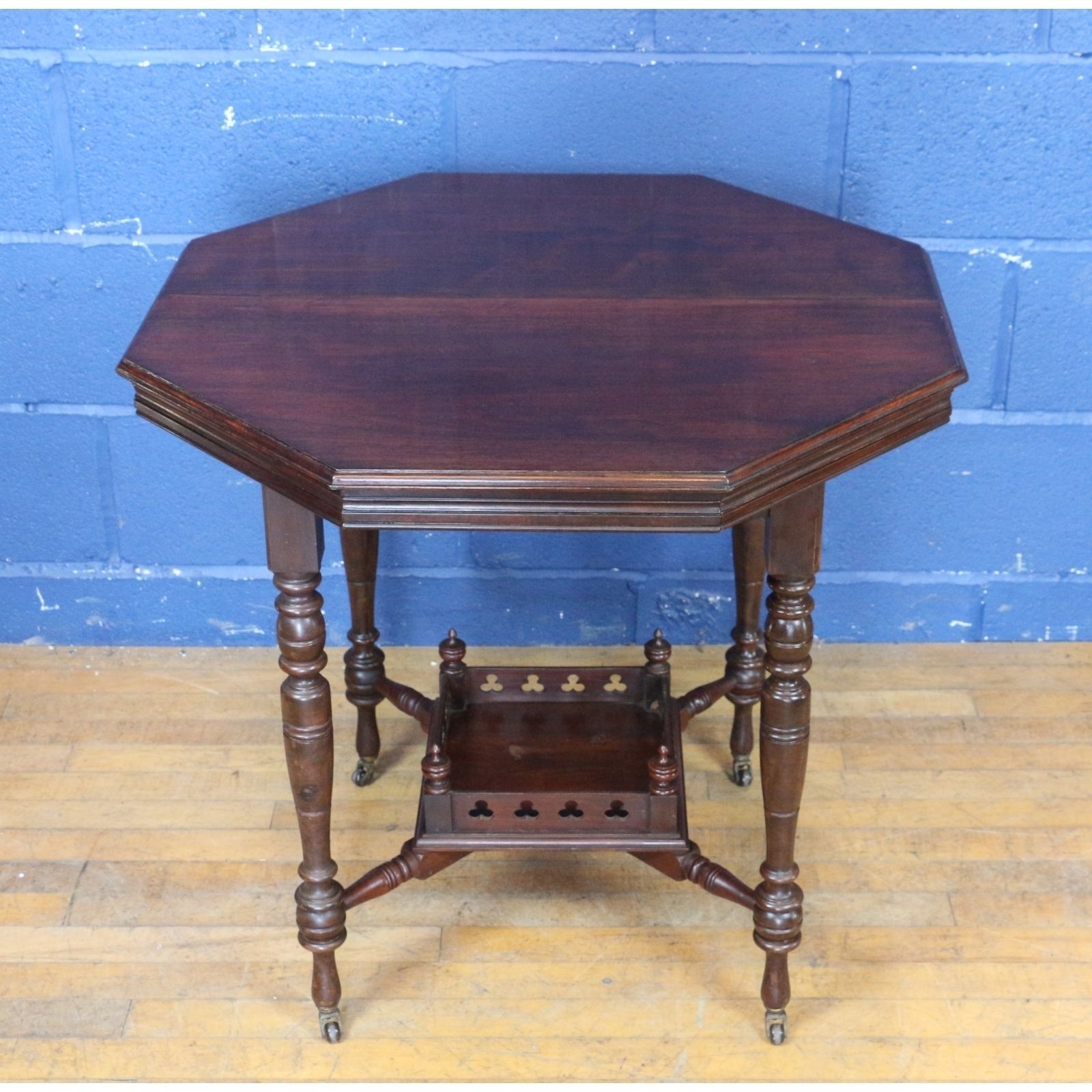A Victorian Walnut Octagonal Two Tier Occasional Table photo for sale