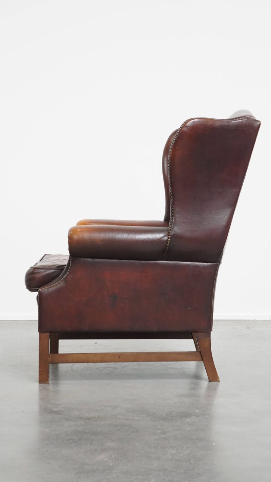 Luxurious, Classic And Comfortable Dark English Style Sheepskin Wing Chair With Lots Of Character And A Beautiful Patina photo 1038.0