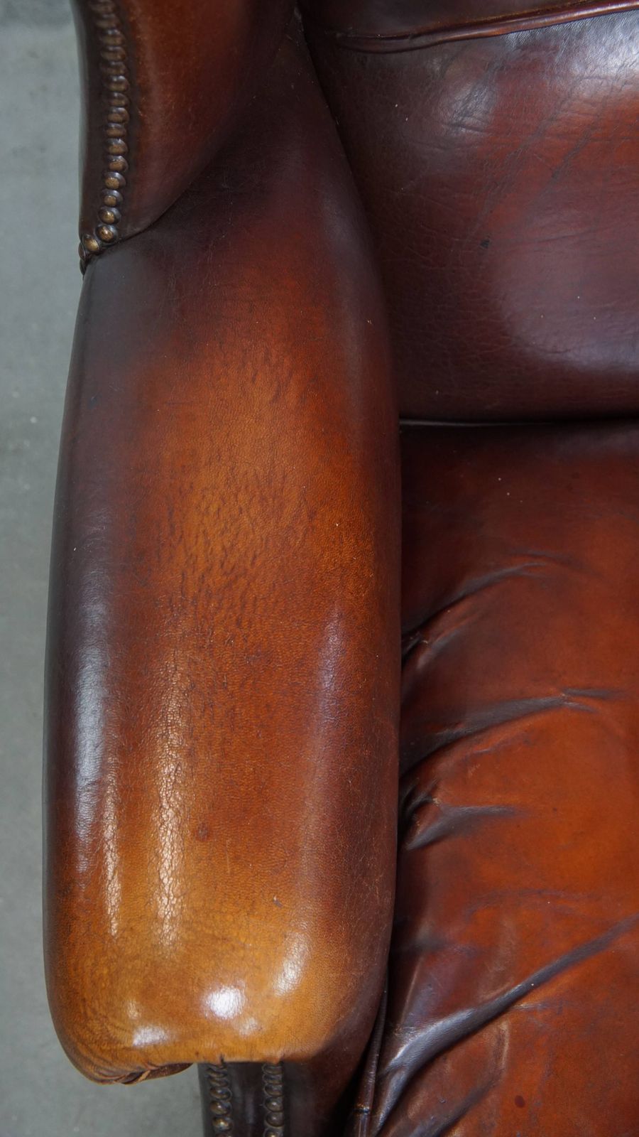 Luxurious, Classic And Comfortable Dark English Style Sheepskin Wing Chair With Lots Of Character And A Beautiful Patina photo buy