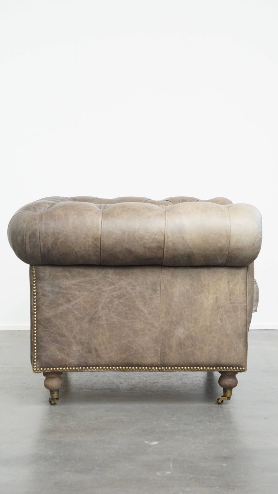 Unique And Spacious Gray Cowhide Chesterfield Club Armchair In English Style On Wheels photo for sale