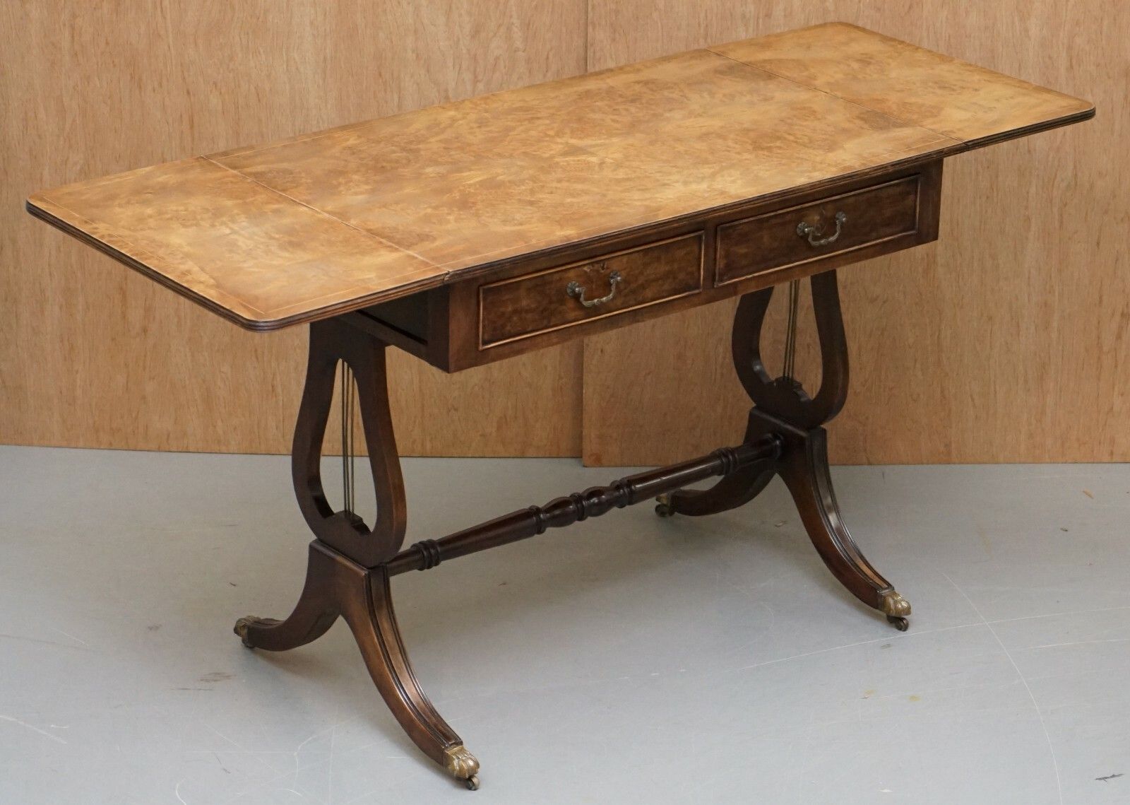 photo furniture Large Extending Occasional Games Table In Burr Walnut Lion Paw Castors + Drawers