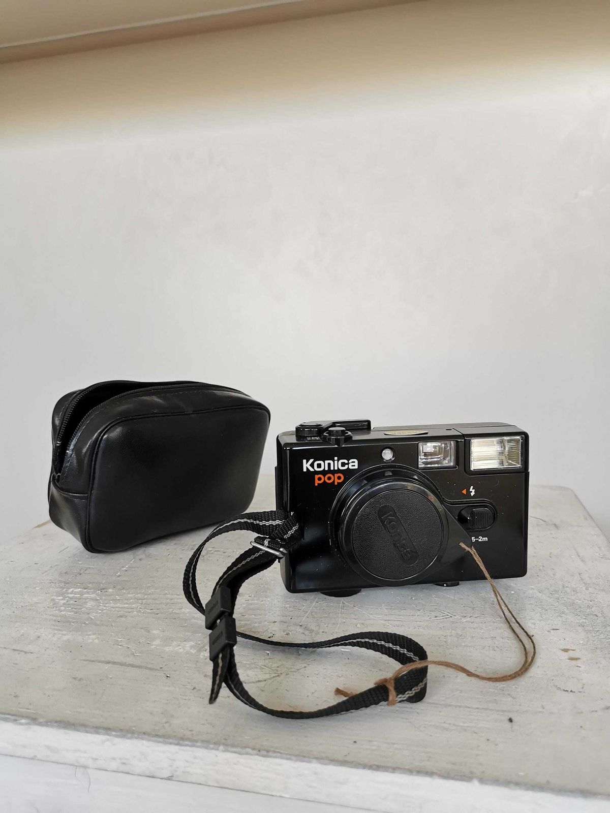 photo furniture Konica Pop 35mm Film Camera With Hexanon Lens – 1980s Point And Shoot With Case And Cap