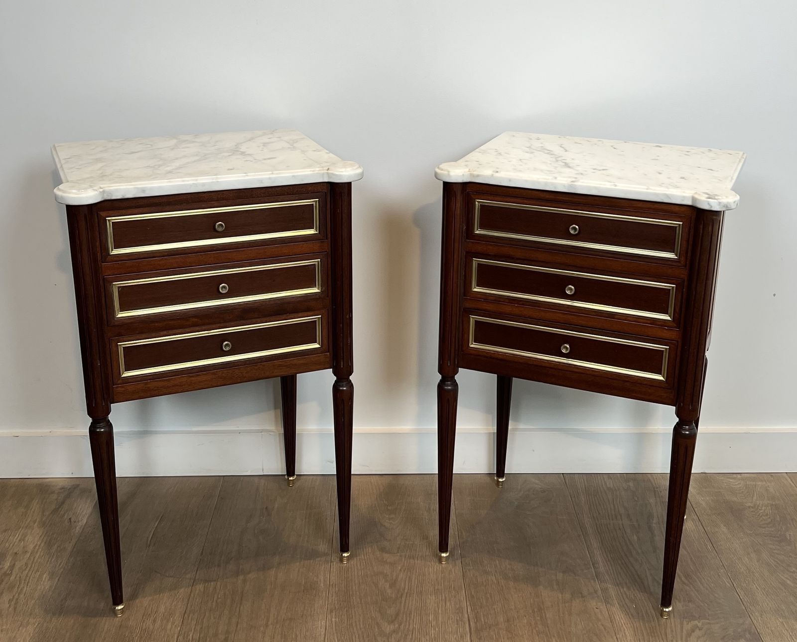 1950.0 Pair Of Mahogany And Brass End Tables Or Bedside Tables With Carrara Marble Tops In The Style Of Maison Jansen. Circa 1940 photo