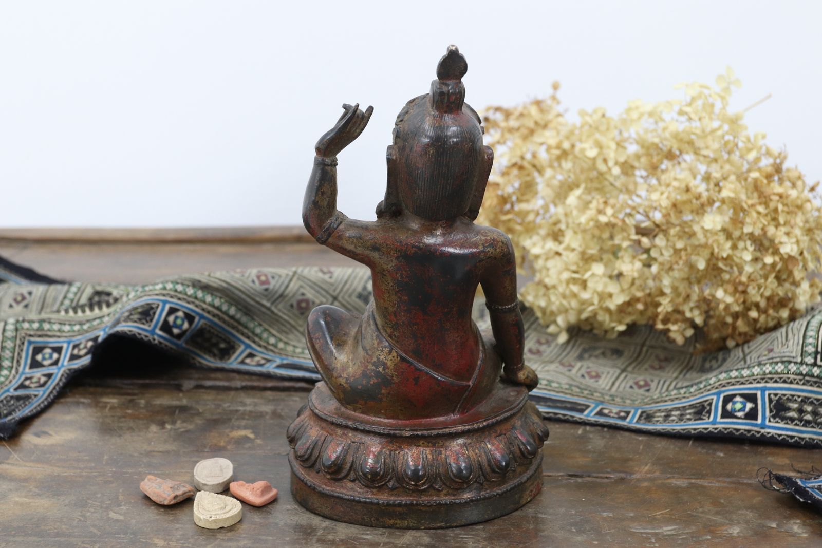 photo for sale Tibetan Bronze Buddha With Traces Of Gold Leaf And Red Lacquer