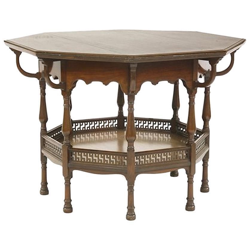 George Faulkner Armitage. An Aesthetic Movement Octagonal Mahogany Center Table