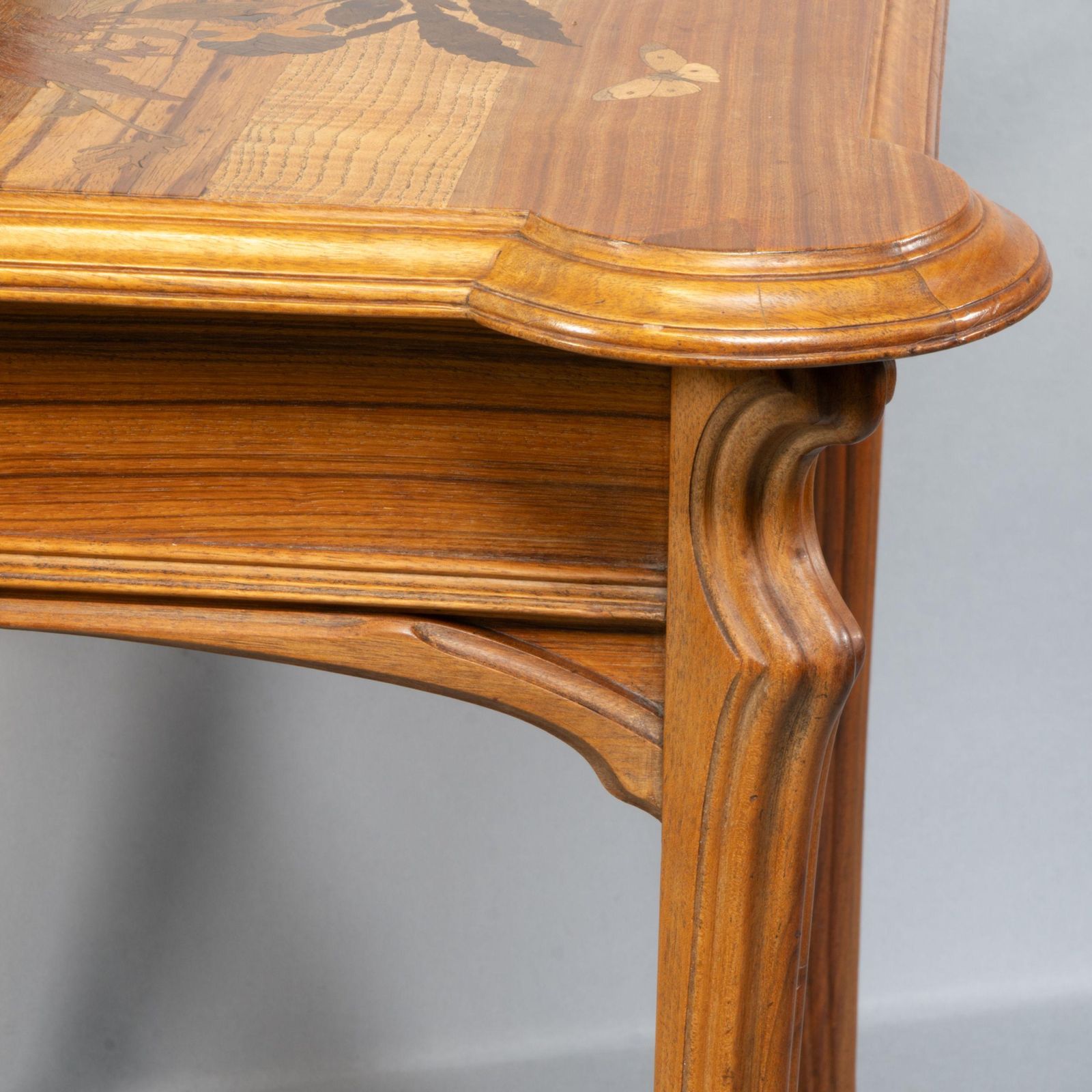 photo vintage Emile Galle. An Art Nouveau Walnut Writing Desk With Exceptional Inlaid Scenery