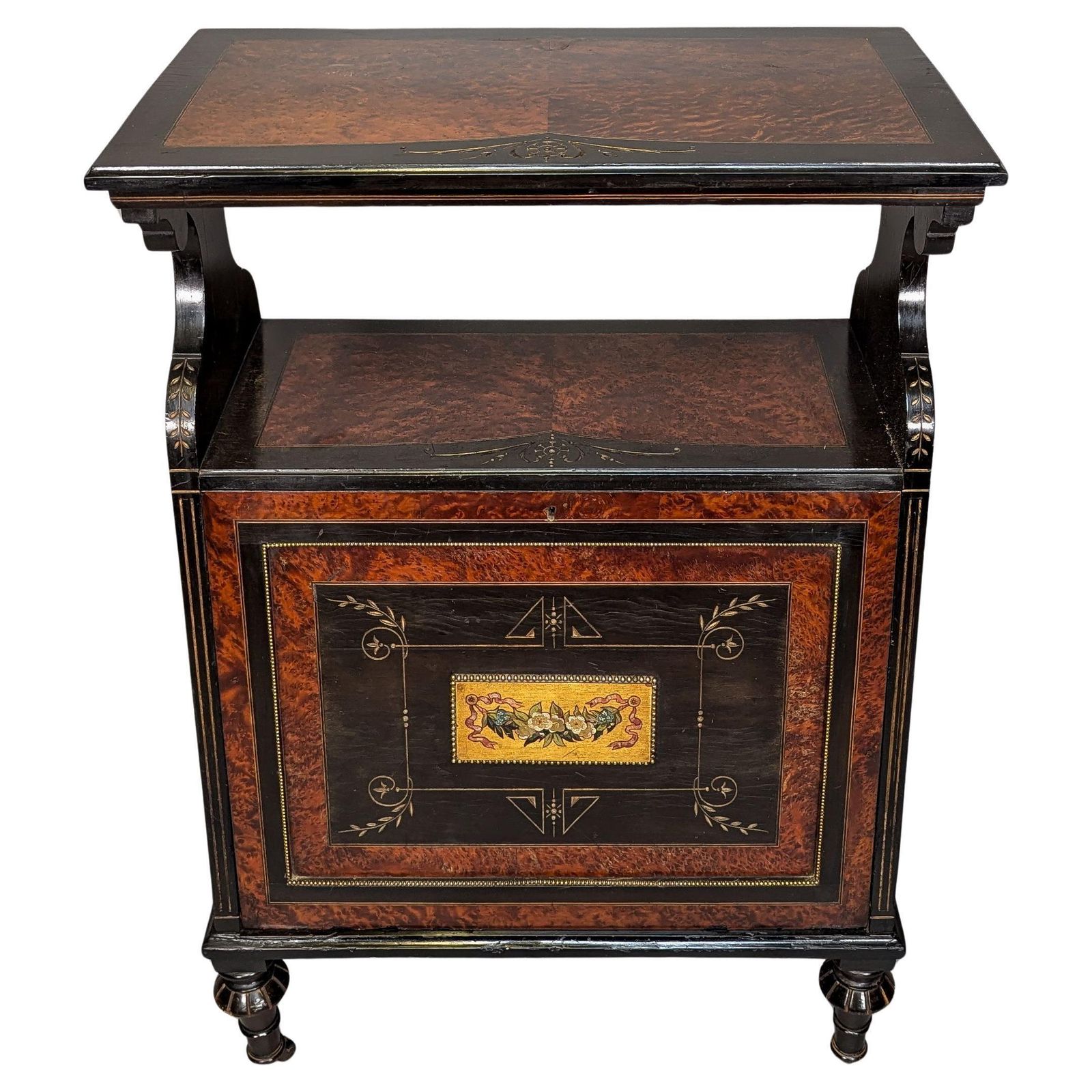 An Aesthetic Movement Amboyna And Ebonized Music Cabinet With Gilt Decoration
