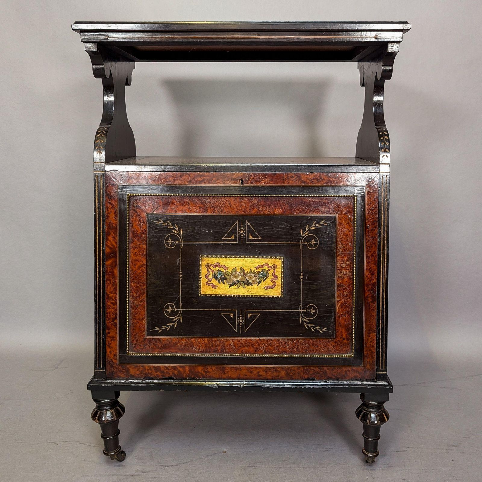 An Aesthetic Movement Amboyna And Ebonized Music Cabinet With Gilt Decoration photo for sale