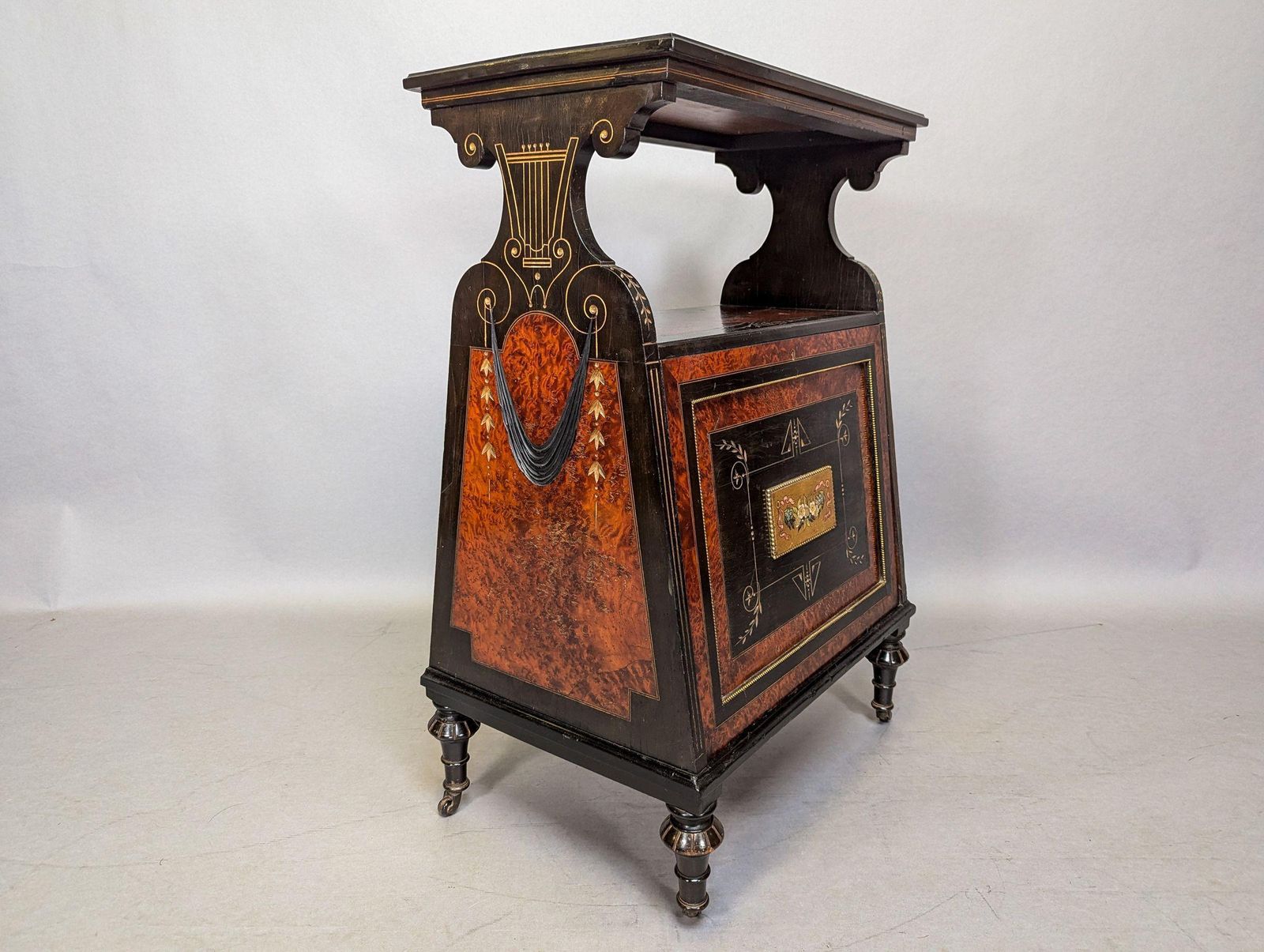 An Aesthetic Movement Amboyna And Ebonized Music Cabinet With Gilt Decoration photo 2856.0