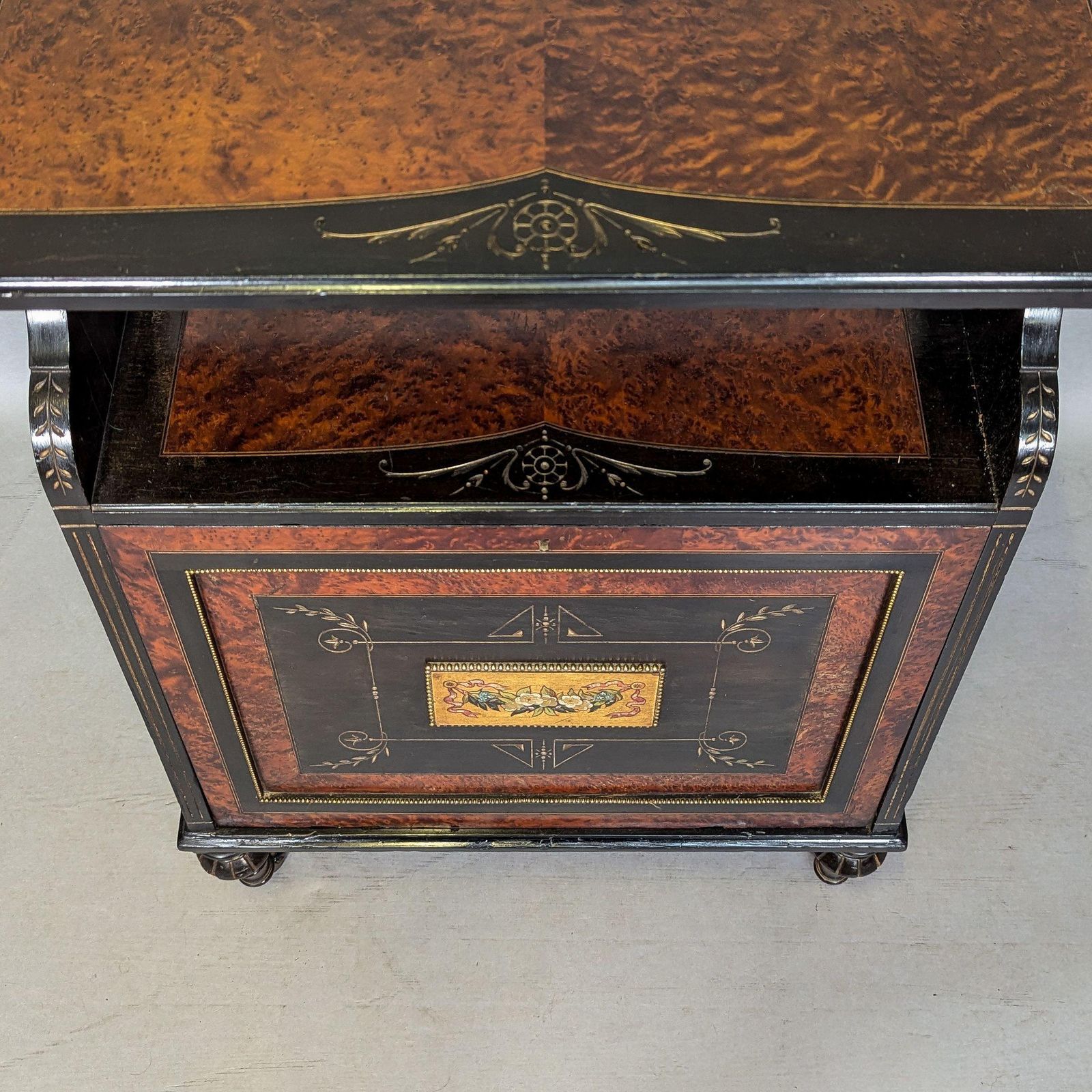 photo vintage An Aesthetic Movement Amboyna And Ebonized Music Cabinet With Gilt Decoration