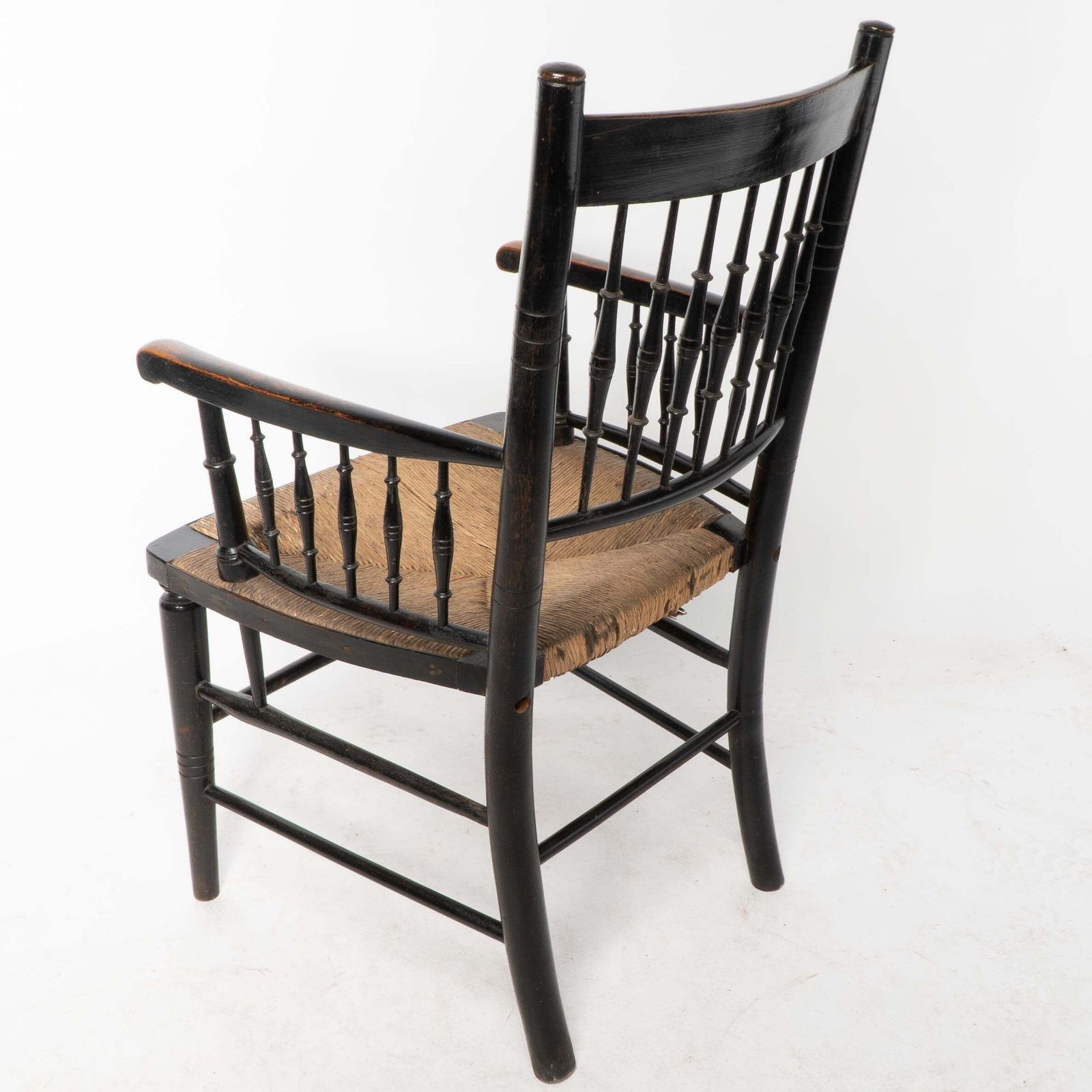 photo vinterior Liberty & Co, Attributed. An Aesthetic Movement Rush Seat Armchair