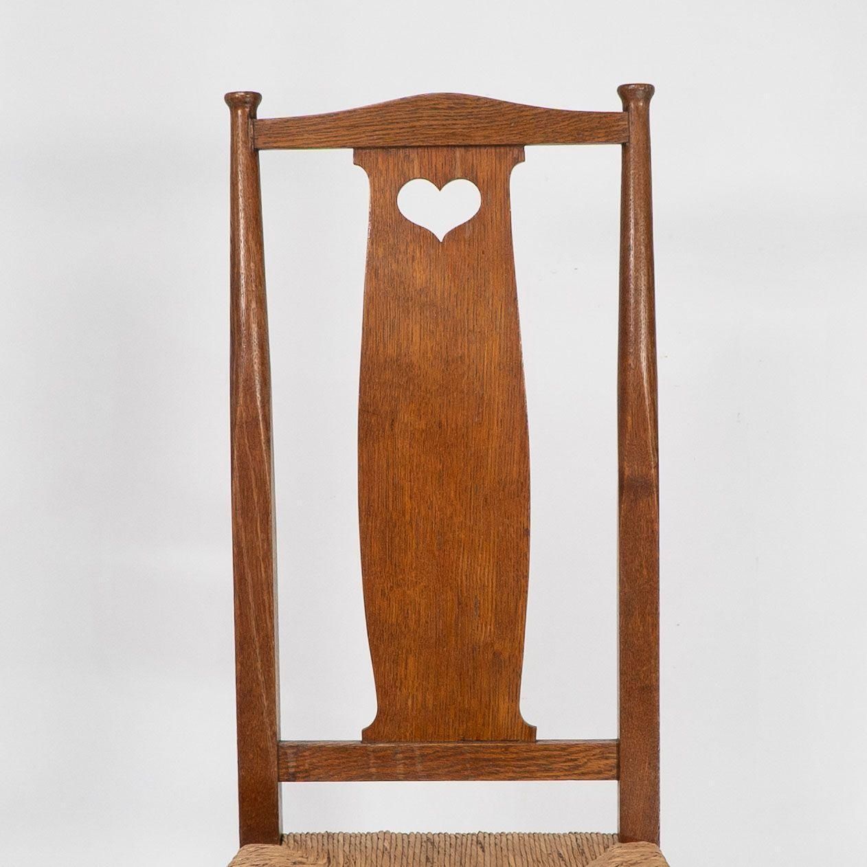 photo for sale Ambrose Heals For Heals Of London. A Pair Of Arts And Crafts Rush Seated Chairs