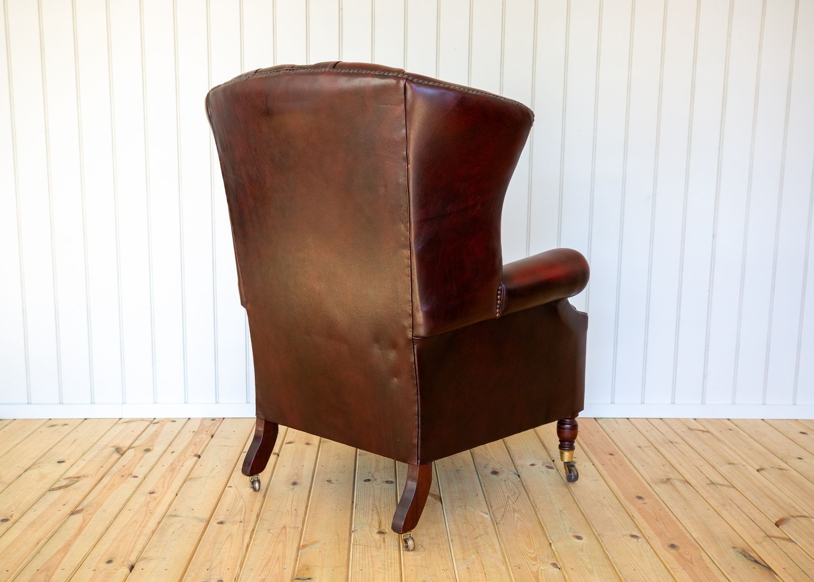Harrods Wingback Chesterfield Armchair Georgian Style Oxblood Red 1990s Casters Fireside Chair Fine Country House photo vinterior