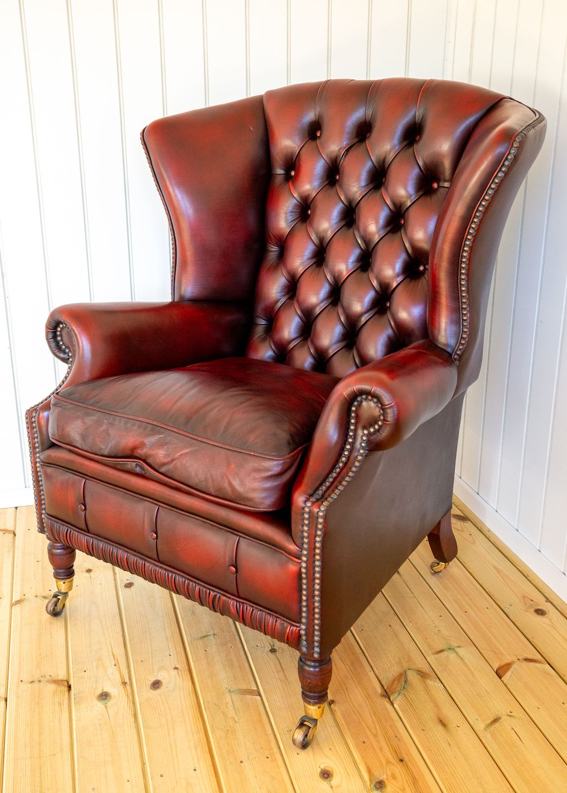 Harrods Wingback Chesterfield Armchair Georgian Style Oxblood Red 1990s Casters Fireside Chair Fine Country House photo for sale