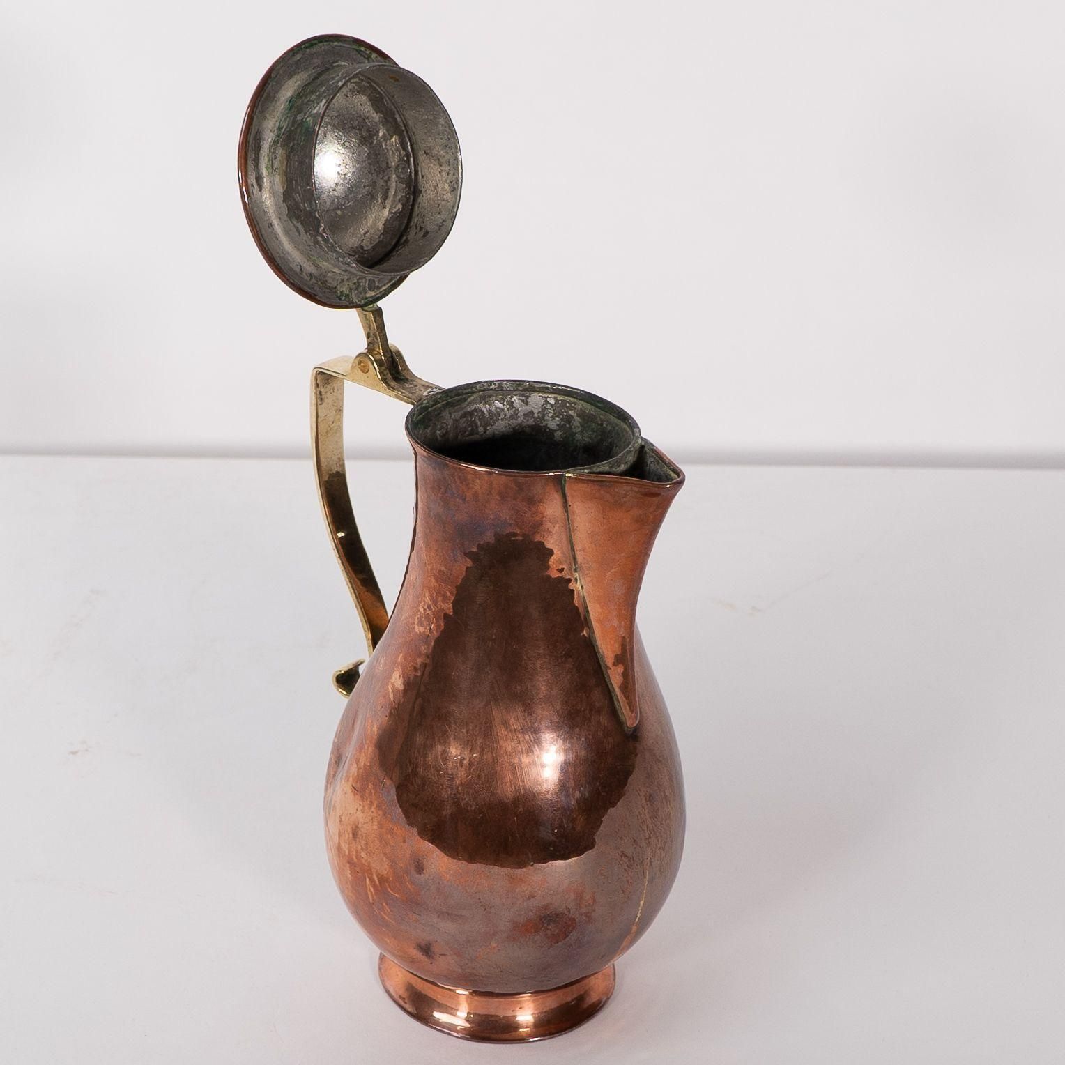 1836.0 Birmingham Guild Of Handicraft. An Arts & Crafts Copper And Brass Chocolate Jug photo