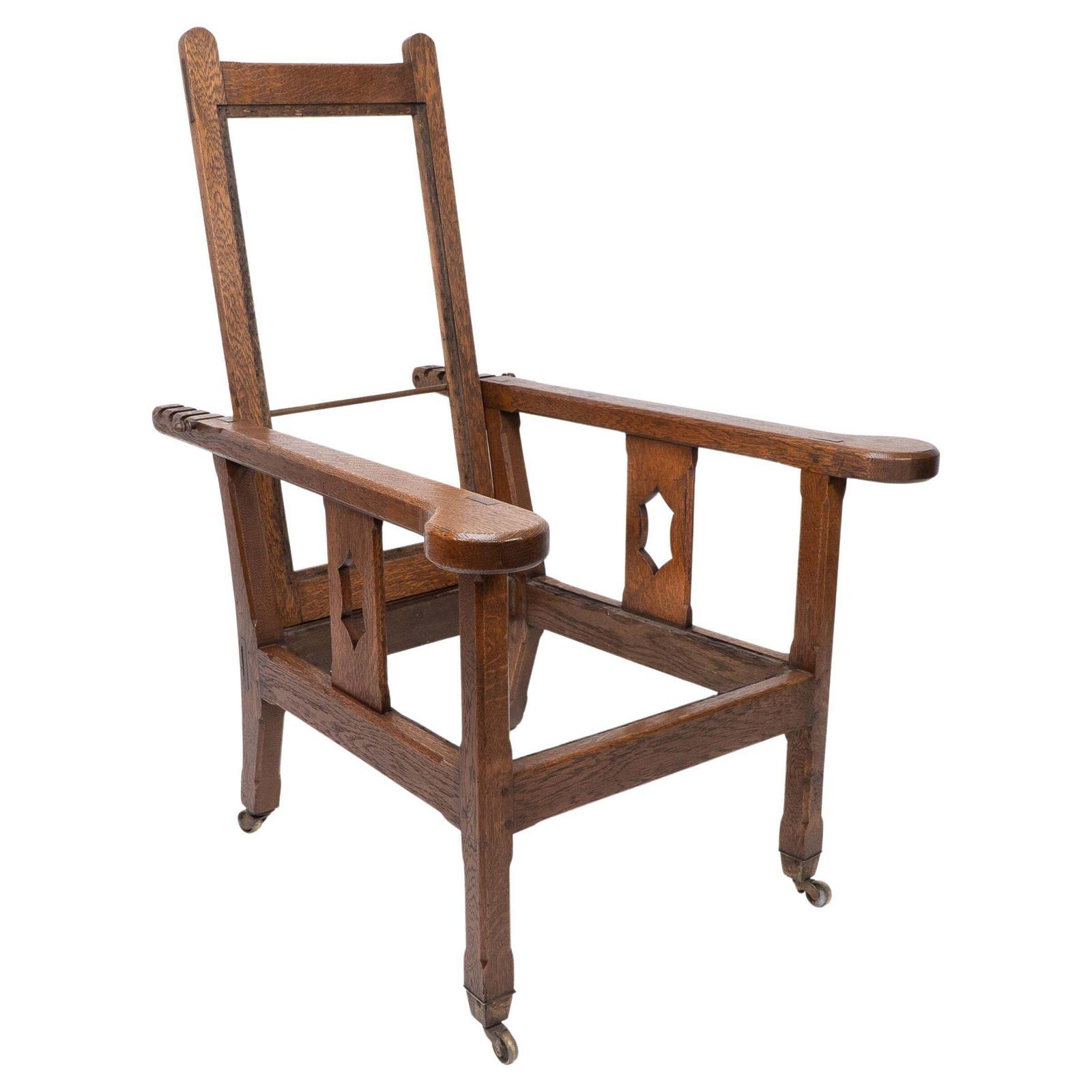 A Cotswold School Arts And Crafts Reclining Oak Armchair Of Superior Quality