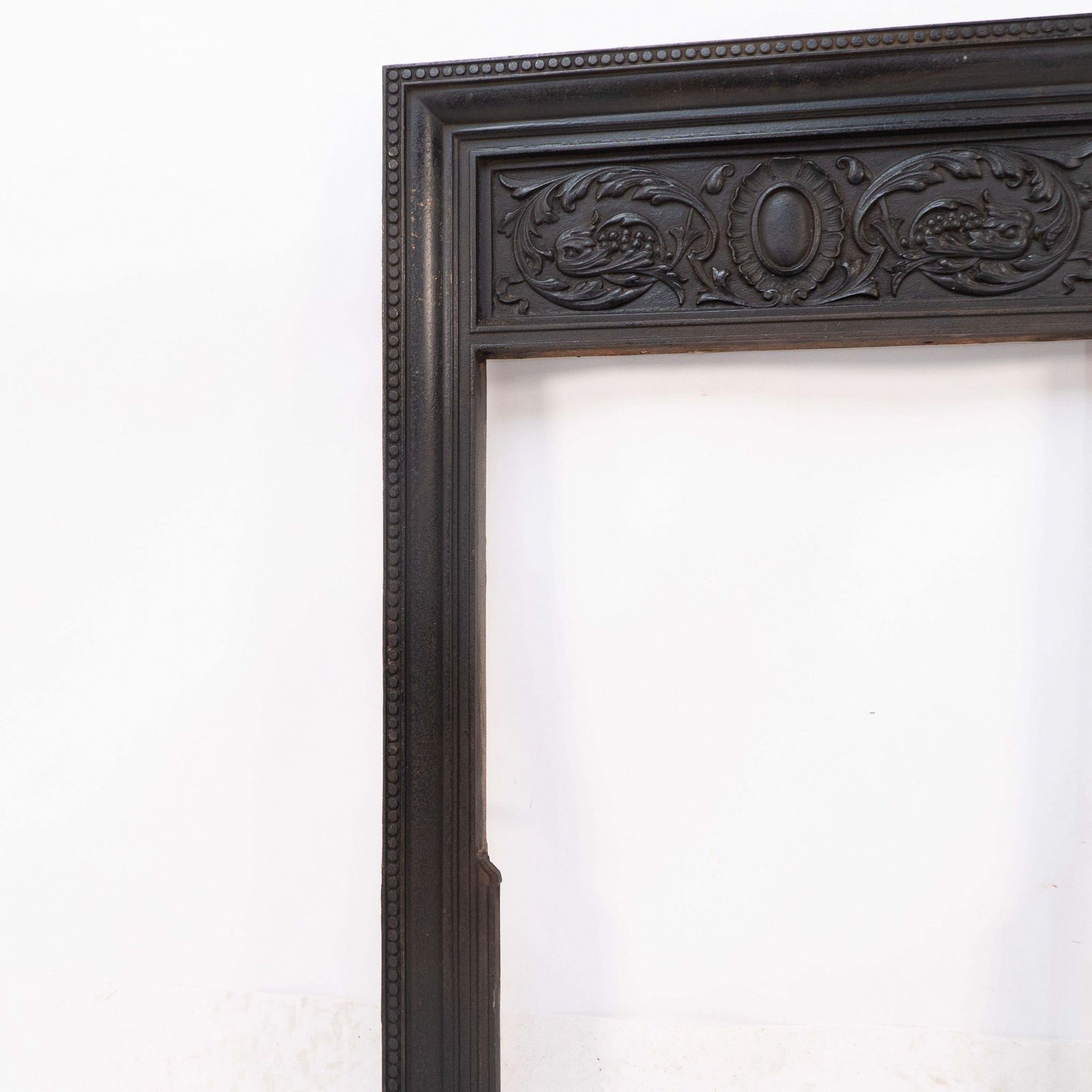 A Late Victorian Fireplace With Stylized Floral Details To The Top photo buy