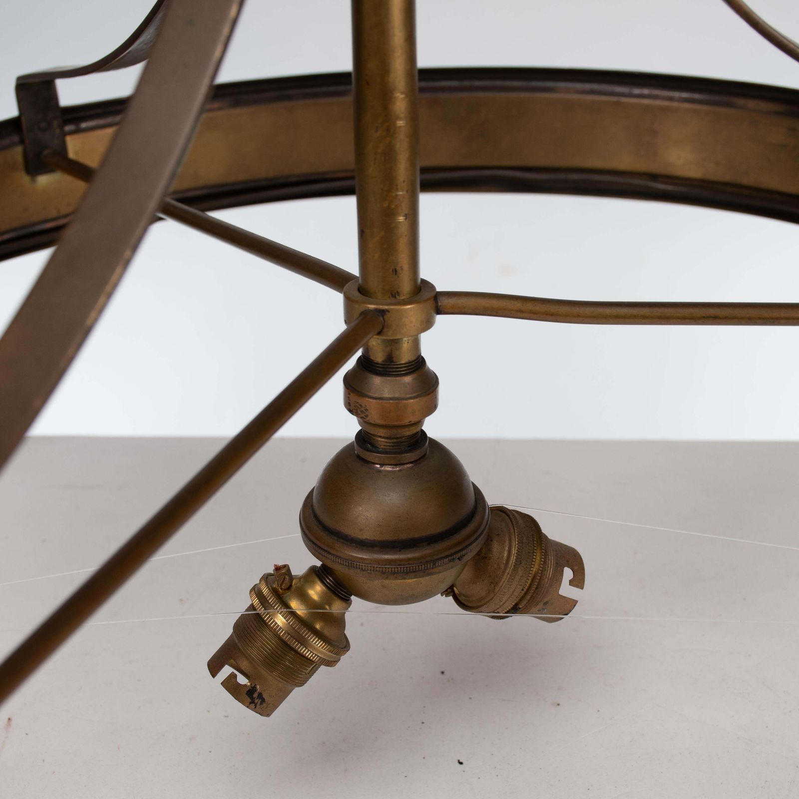 Lighting An Arts & Craft Ceiling Light With Stylized Petals & A Circular Brass Ring photo